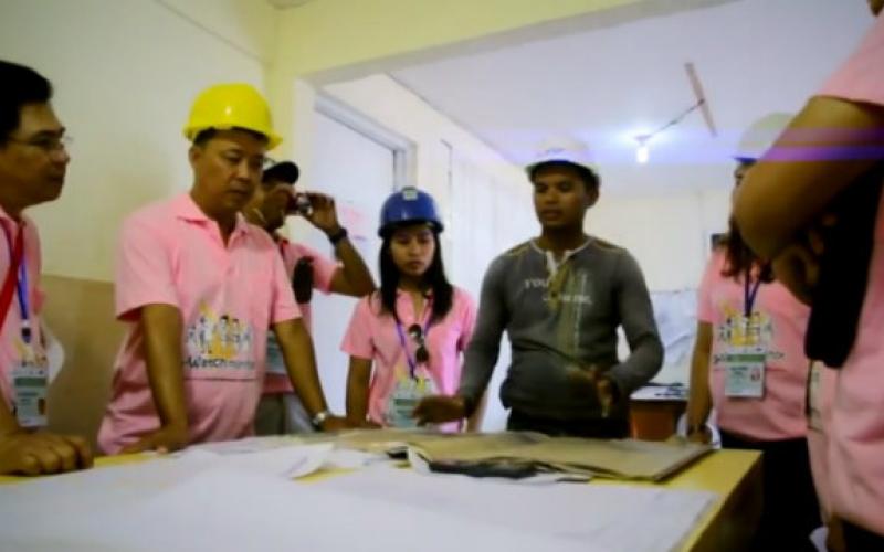 PARTICIPATORY GOVERNANCE. G-Watch volunteers engage with the engineer in charged with the construction of a public infrastructure project. Screenshot from the G-Watch video